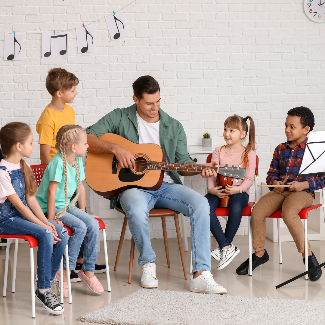 multi aged kids performing together in a beginning band